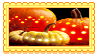 three pumpkins with lights
